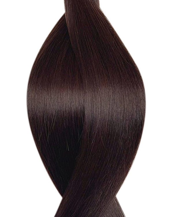 Naturalne włosy do przedłużania metoda secret tape on w kolorze ciemny czekoladowy brąz.