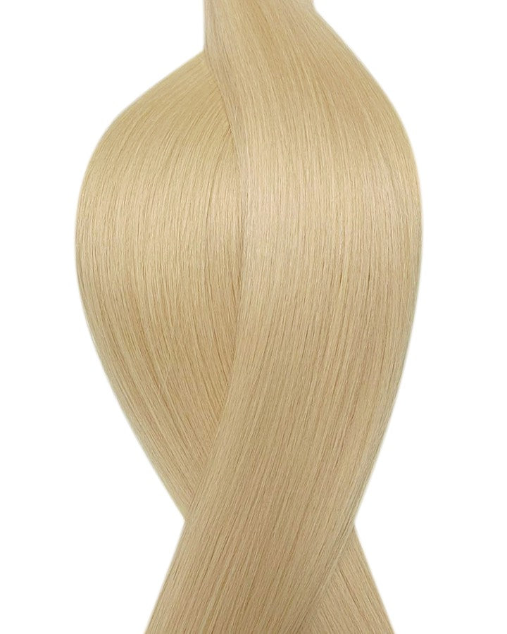 Naturalne włosy do przedłużania metoda secret tape on w kolorze bardzo jasny blond.