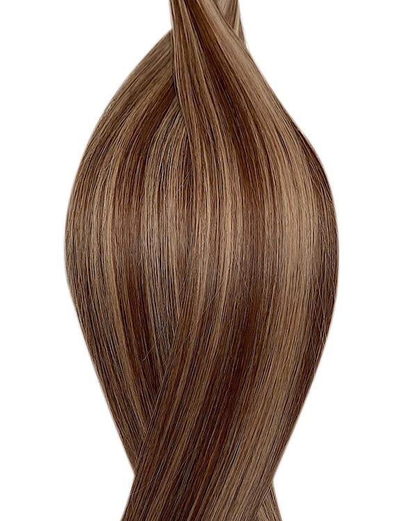 Naturalne włosy do przedłużania metoda na keratynę w kolorze balejaż średni brąz i ciemny blond.