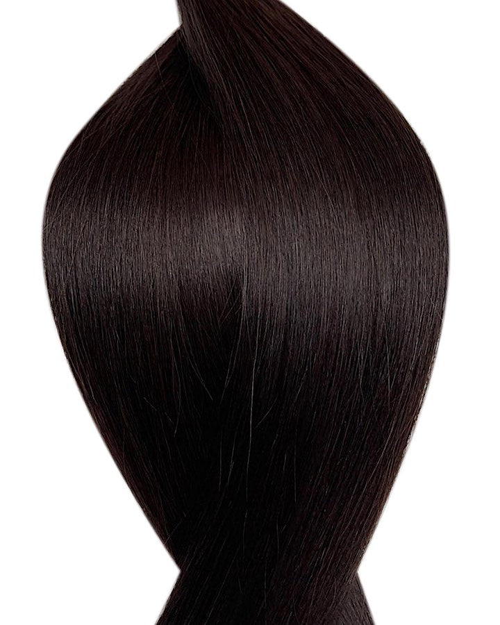 Naturalne włosy do przedłużania metoda na keratynę w kolorze bardzo ciemny brąz.