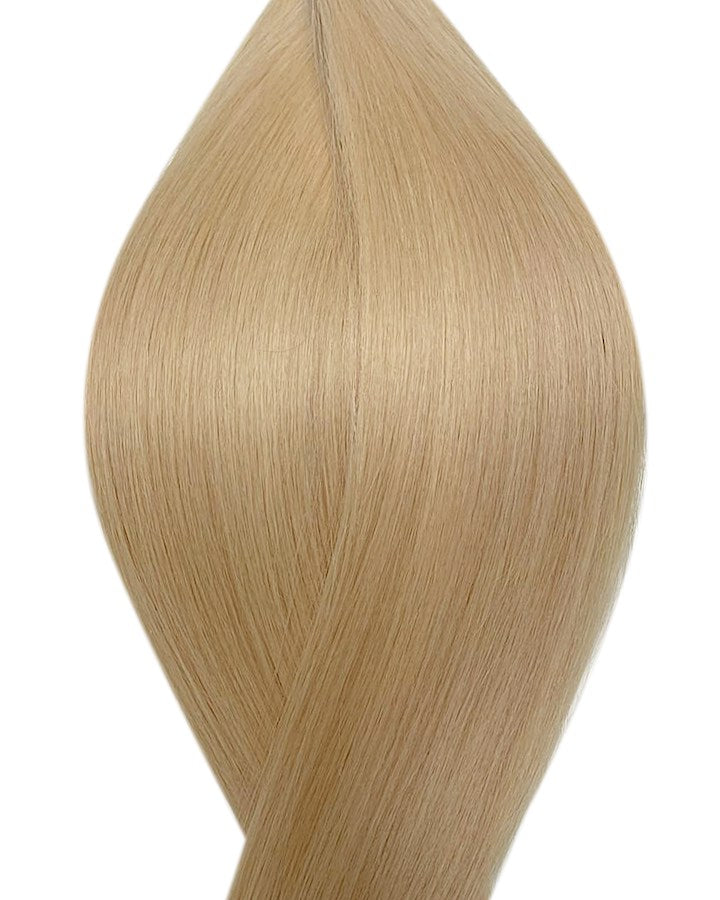 Naturalne włosy do przedłużania metoda na keratynę w kolorze jasny popielaty blond.