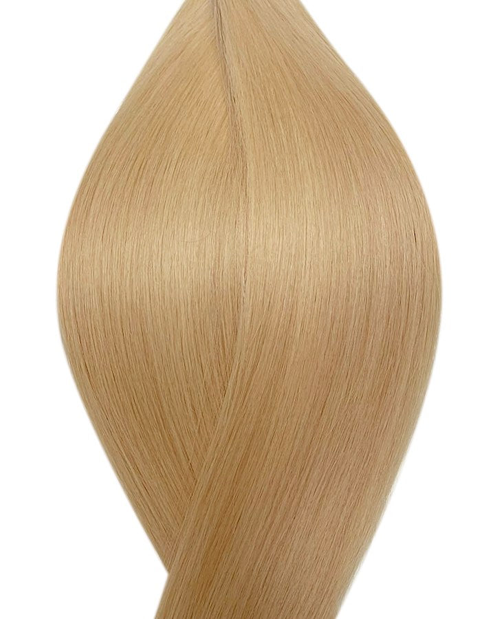 Naturalne włosy do przedłużania metoda na keratynę w kolorze złoty blond.