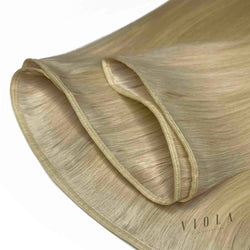 Naturalne włosy do przedłużania metodą na taśmie flat weft dostępne w długościach: 45cm, 50cm i 55cm.