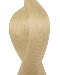 Naturalne włosy do przedłużania metoda na taśmie silikonowej w kolorze bardzo jasny blond.