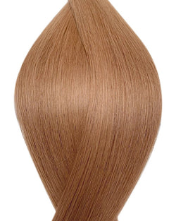 Naturalne włosy do przedłużania metodą na taśmie weft w kolorze bardzo jasny kasztan. 