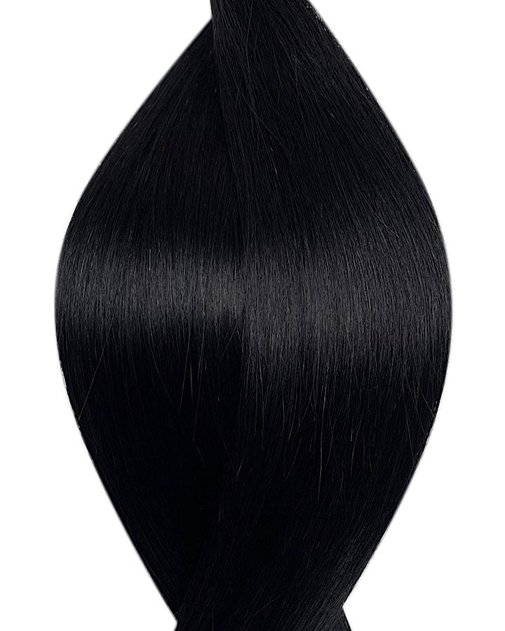 Naturalne włosy do przedłużania metoda tape on w kolorze czarny.
