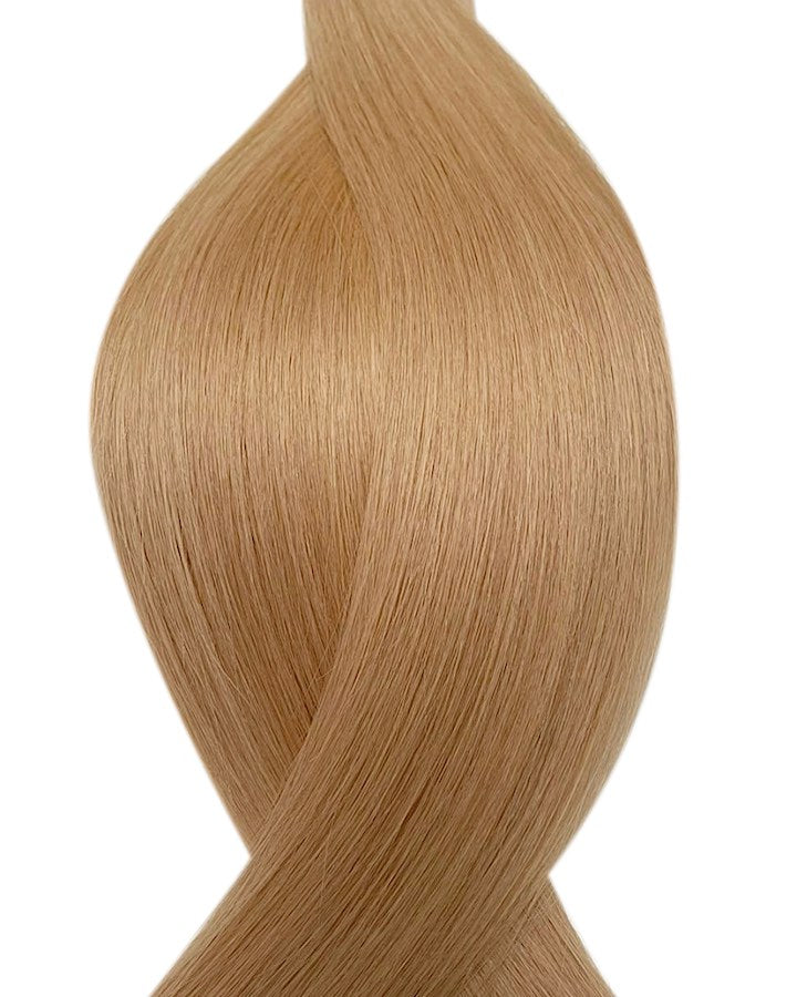 Naturalne włosy do przedłużania metoda tape on w kolorze jasny naturalny blond.