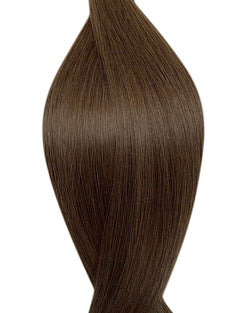 Naturalne włosy do przedłużania metoda tape on w kolorze jasny popielaty brąz.