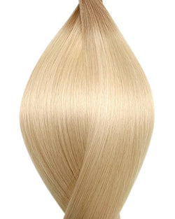 Naturalne włosy do przedłużania metoda tape on w kolorze ombre ciemny popielaty i platynowy blond.