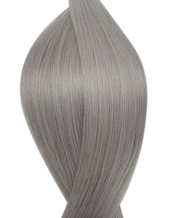Naturalne włosy do przedłużania metoda tape on w kolorze srebrny.