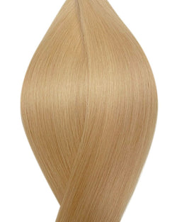 Naturalne włosy do przedłużania metoda tape on w kolorze złoty blond.